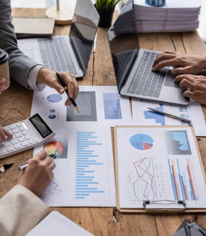 financial-analysts-analyze-business-financial-reports-on-digital-tablet-planning-investment-project.jpg